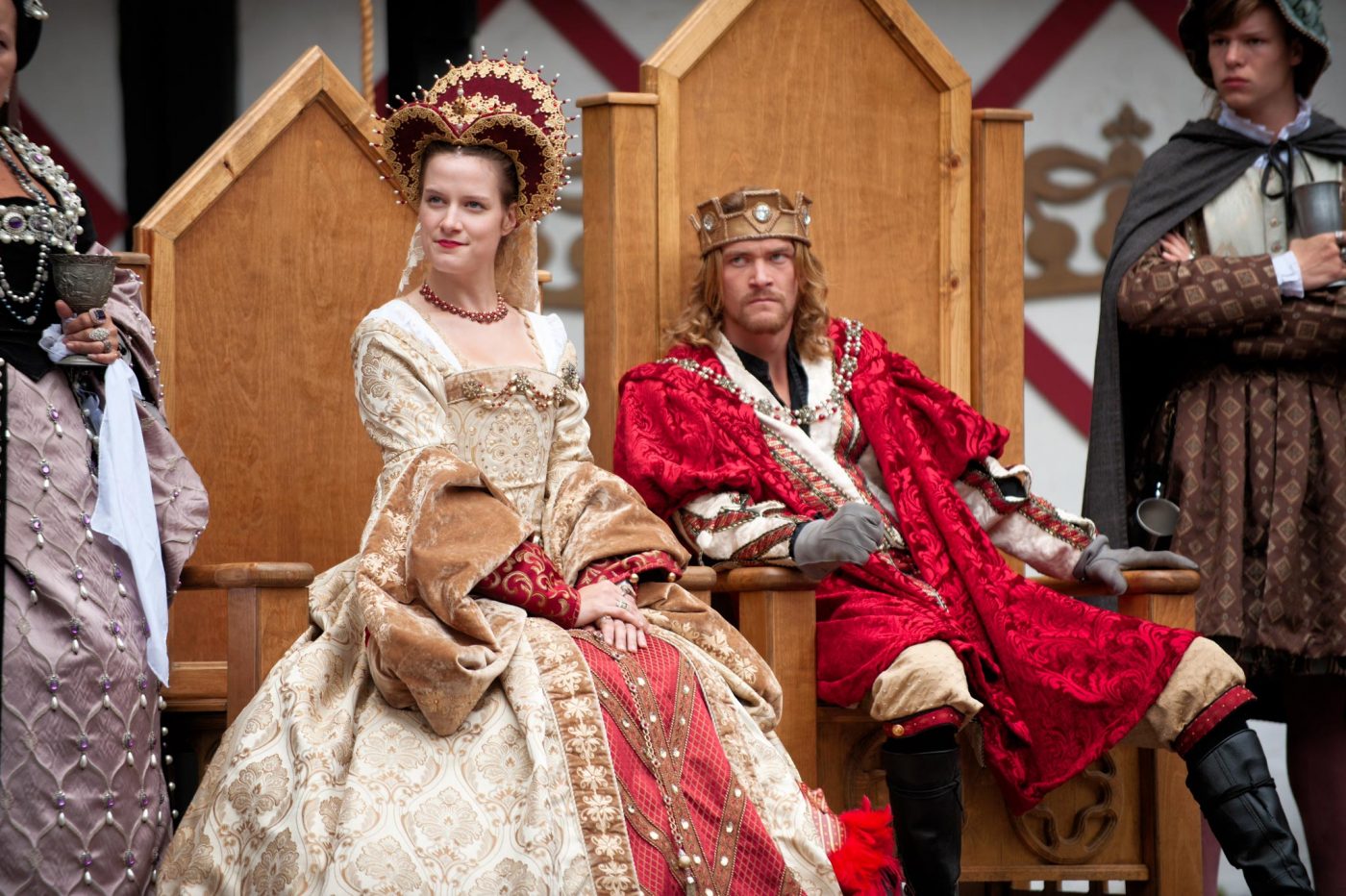 Queen Catherine of Aragon (played by Megan Jones) and Henry VIII, by the Grace of God, King of England, France and Lord of Ireland (played by Zach Minder) and Charles Brandon (played by Brian Huff) at the 2016 Pennsylvania Renaissance Faire.